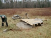 Colin digging out a footing for the deck of the Skyshed Pod.