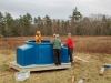 Discussing the next step after installing the walls of the Skyshed Pod.